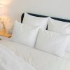 Prześcieradło z gumką kremowe 100 x 200 x 30 cm – miękkie i trwałe